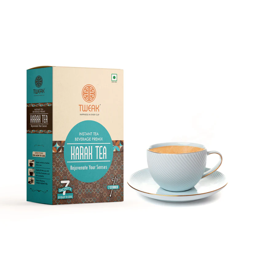 A rich, frothy cup of instant Karak tea prepared using single-serve sachet