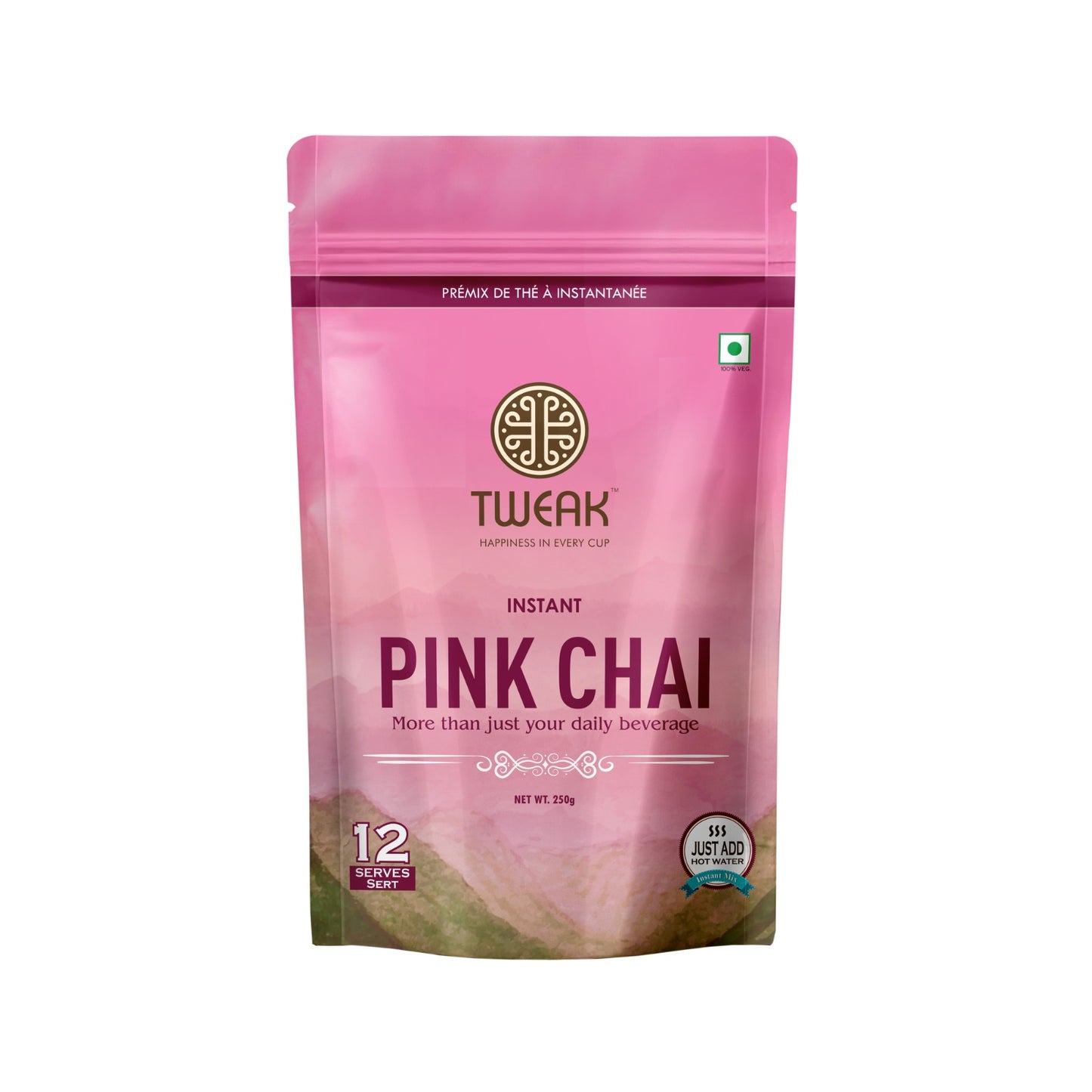 A creamy, pink cup of traditional Kashmiri chai topped with crushed nuts