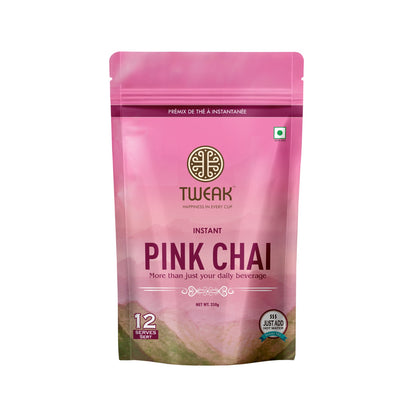 A creamy, pink cup of traditional Kashmiri chai topped with crushed nuts